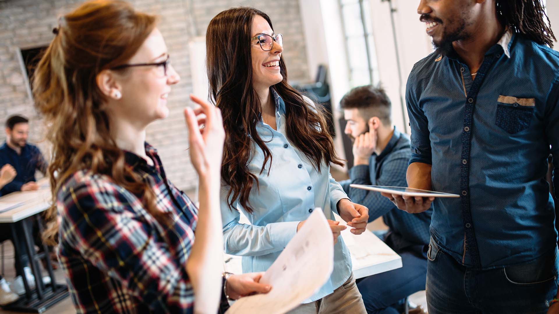 portrait-of-architects-having-discussion-in-office