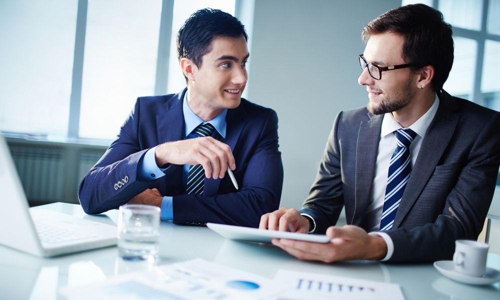 project discussion between two businessman
