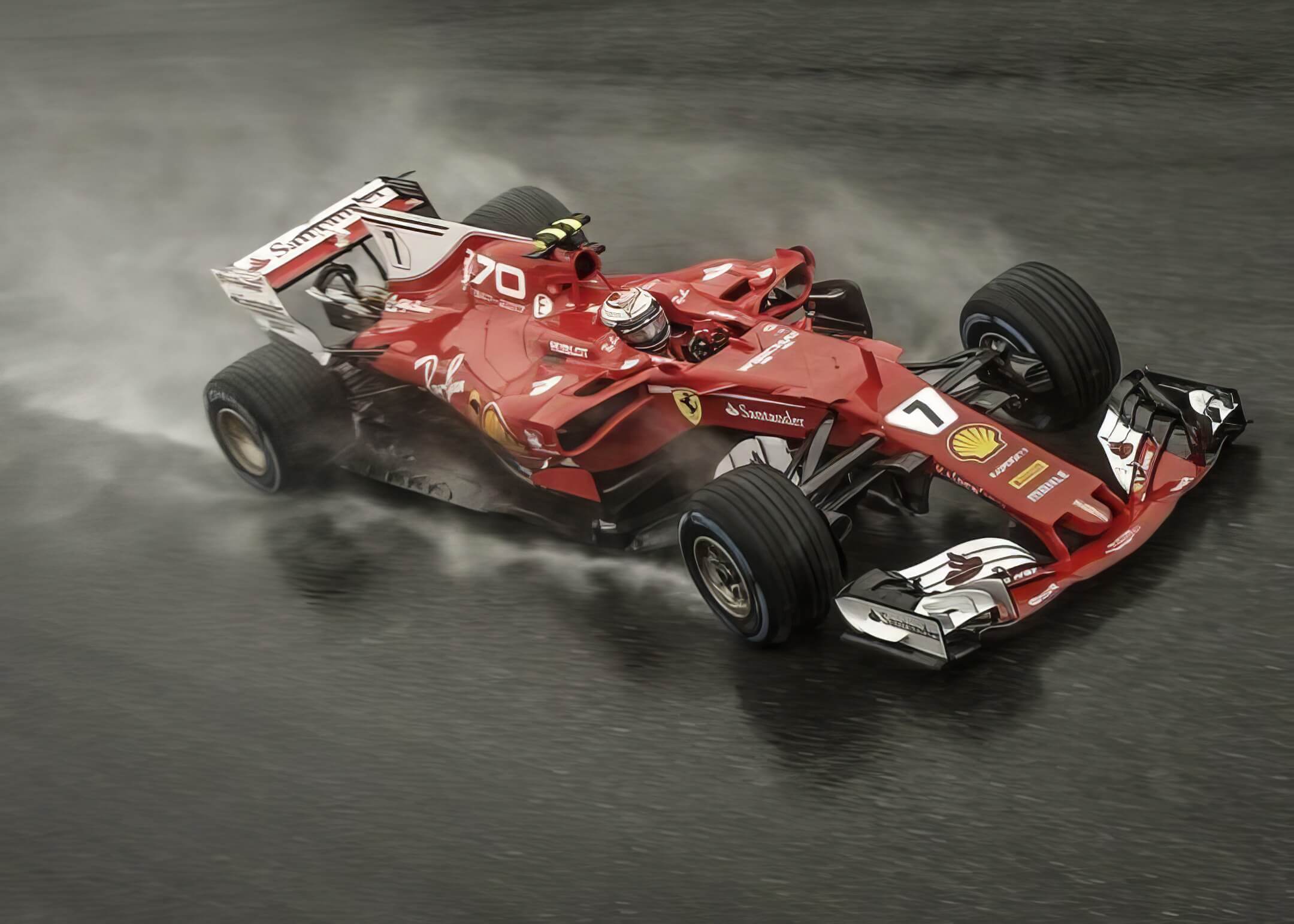 red f1 car drifting