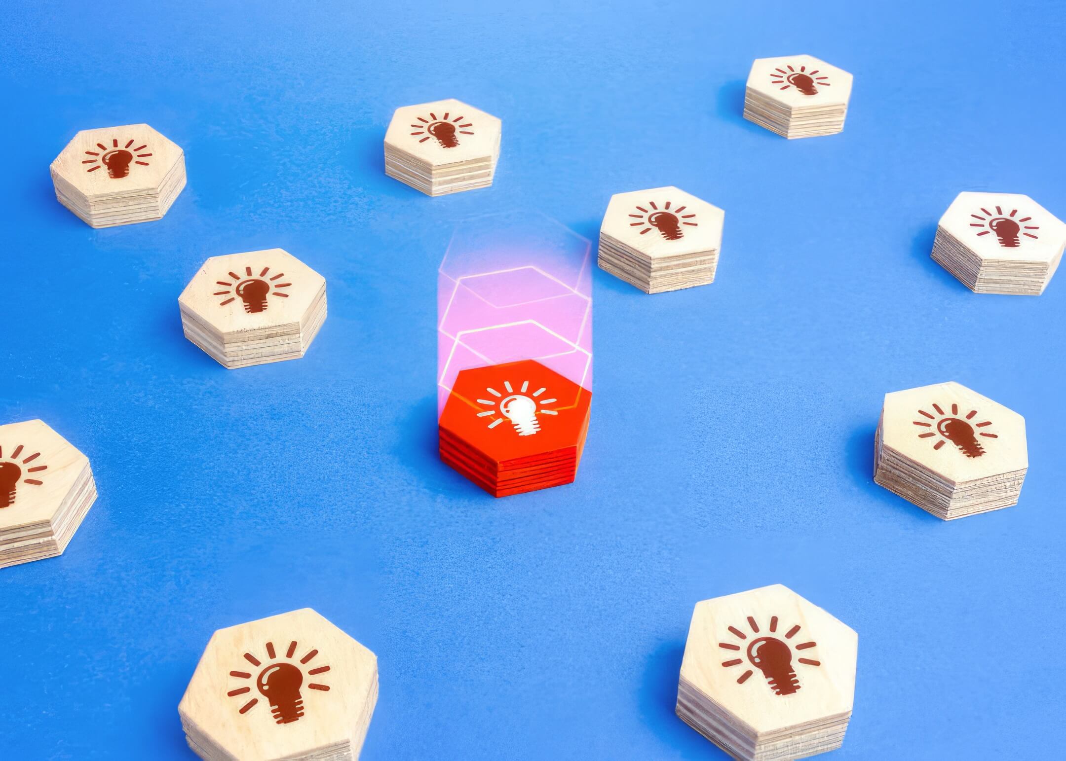 red hexagon surrounded by wooden hexagons with lightbulb icon