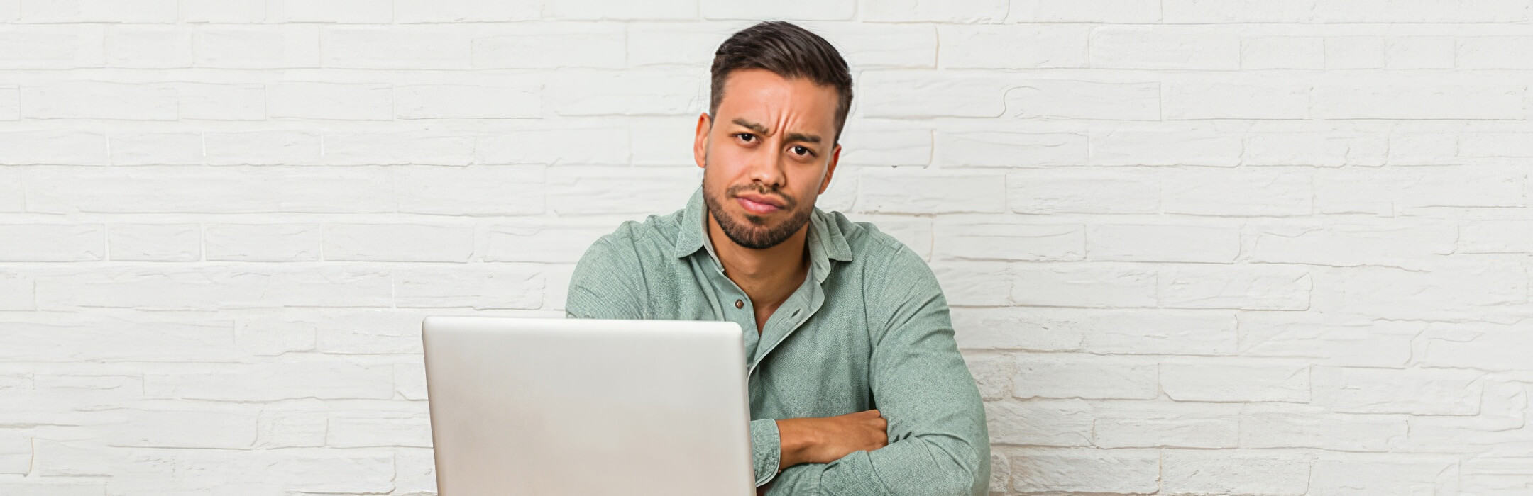 skeptical man at desk