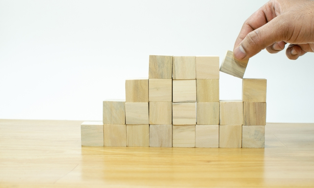 stacking wooden square dices