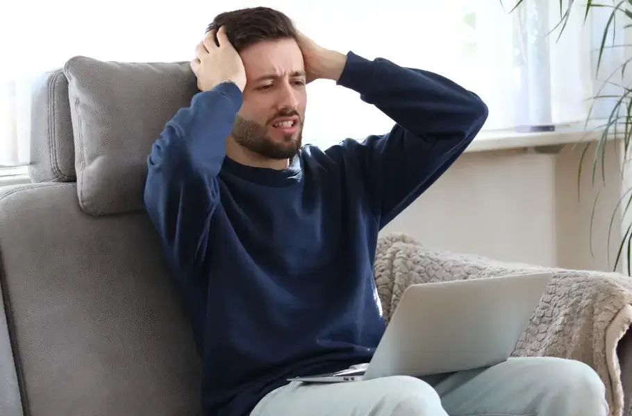 Stressed businessman at desk