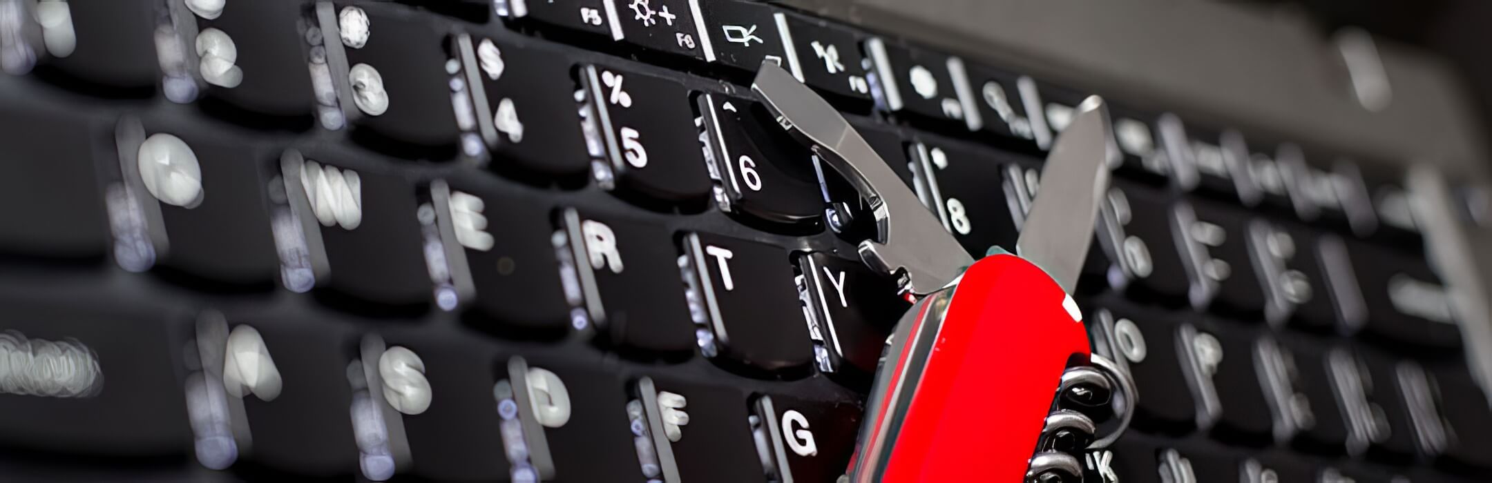 swiss-army-knife-on-keyboard