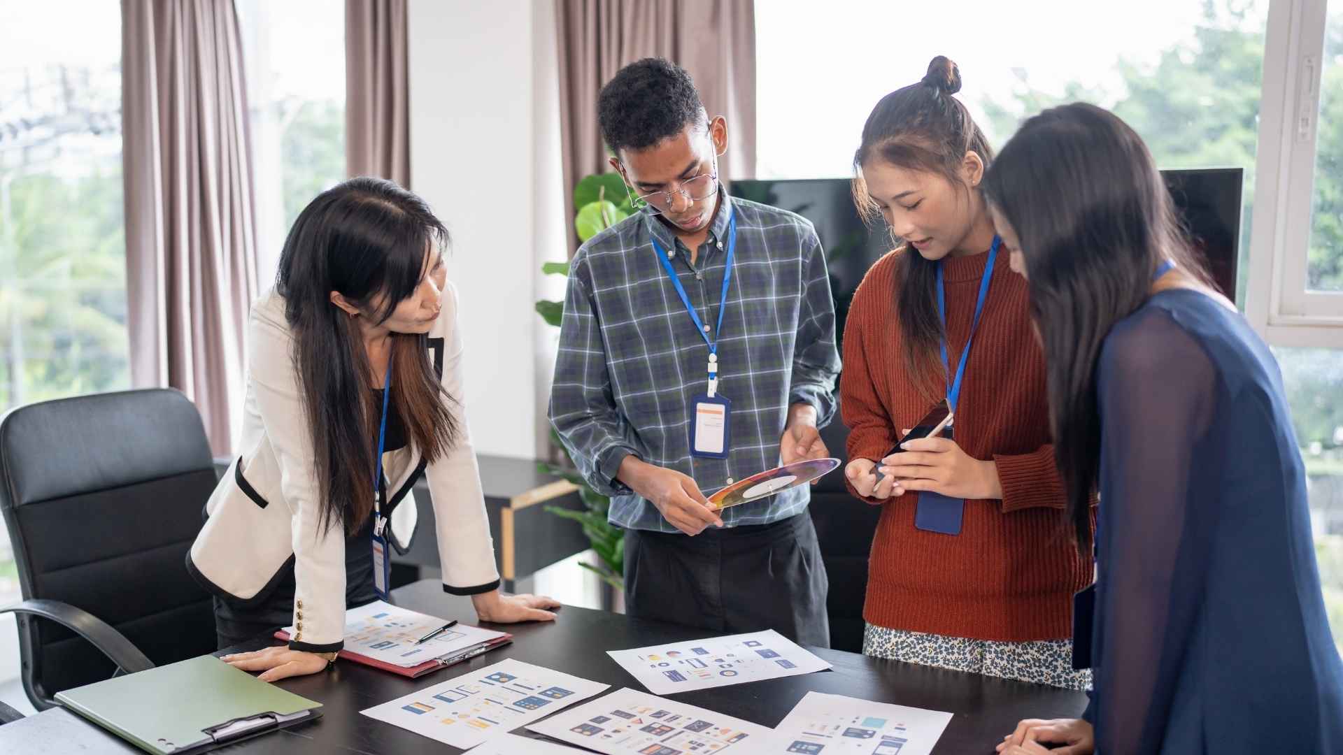 team of designers and developers having a meeting for the new project