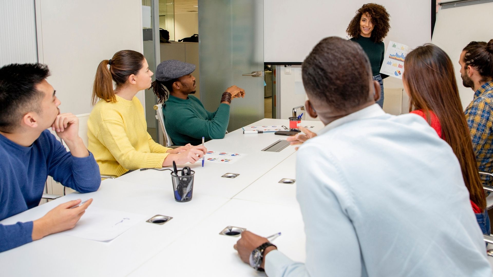 team of designers discussing strategy