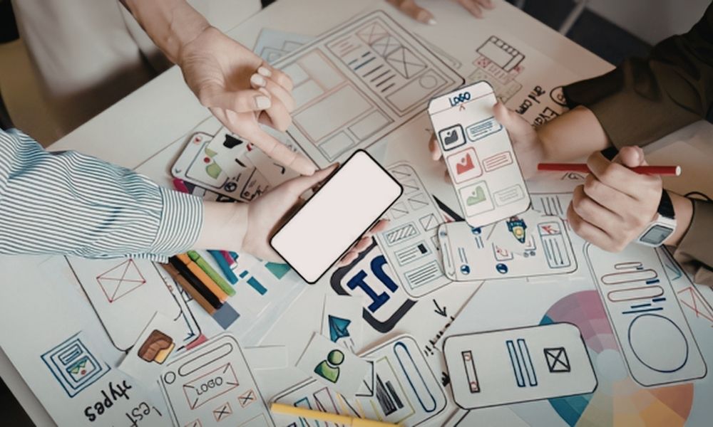 team of designers working a new UXUI project