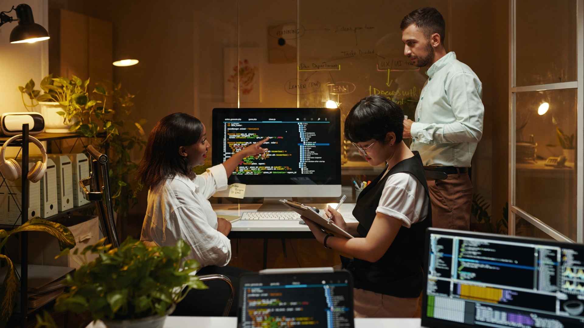 three people pulling all-nighter to finish the codes