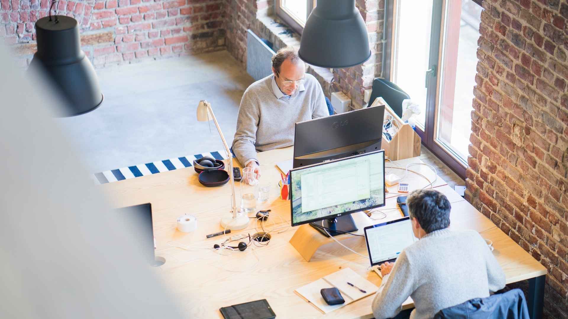 two people doing different types of competitive monitoring