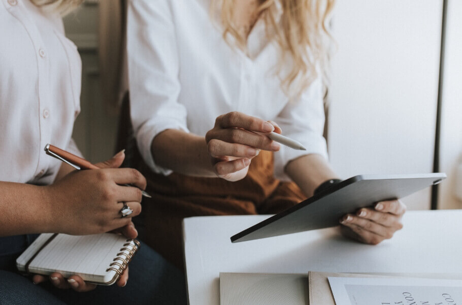 Two people doing social media marketing strategy