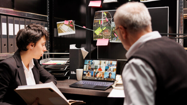 two-people-testing-at-a-computer