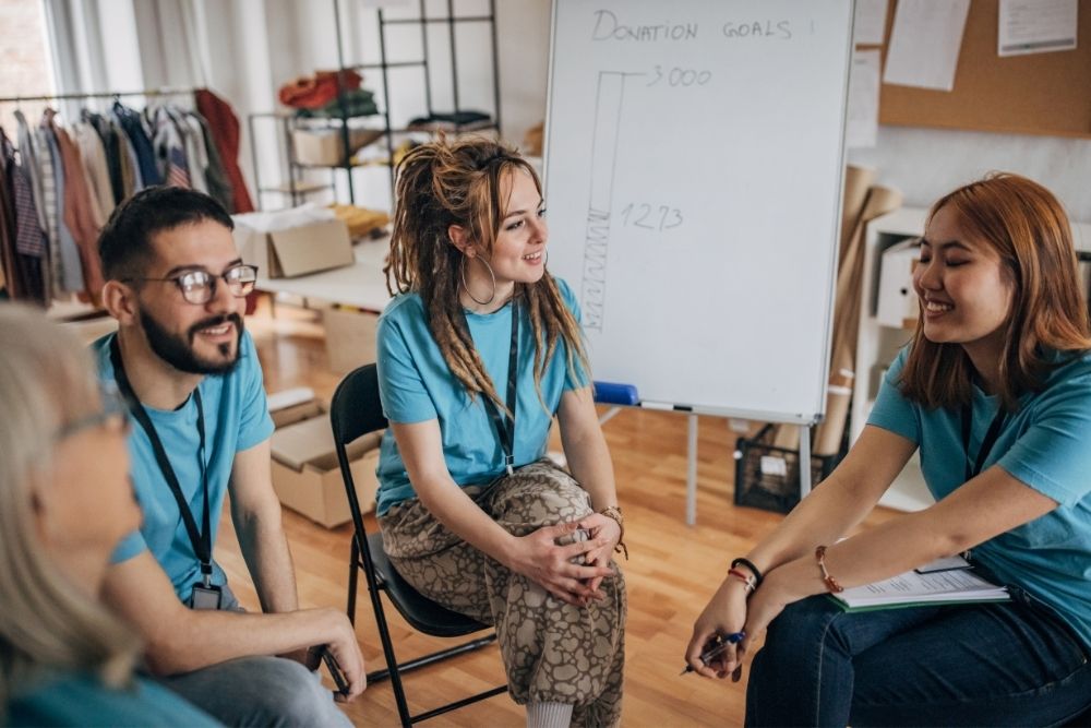 volunteers meeting at the charity center