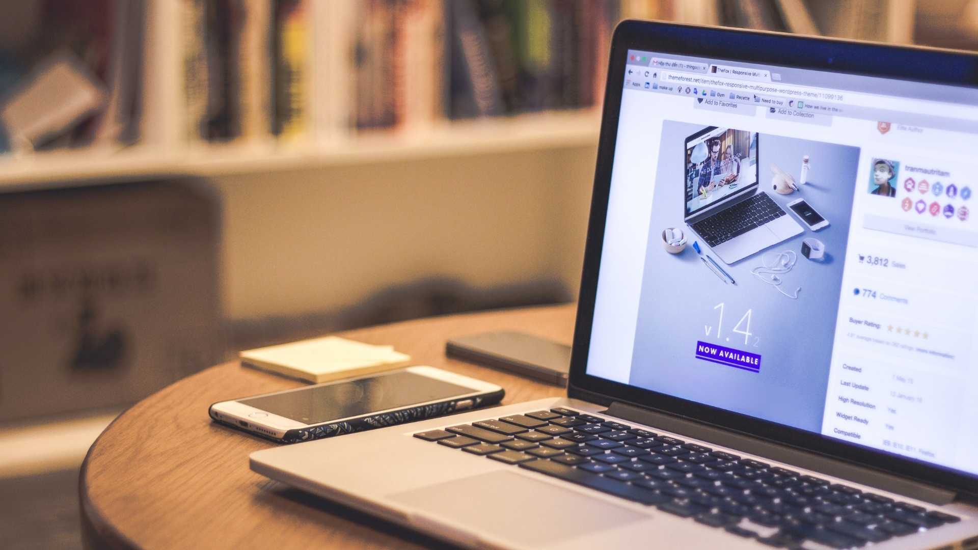 website showing on the laptop screen in the library