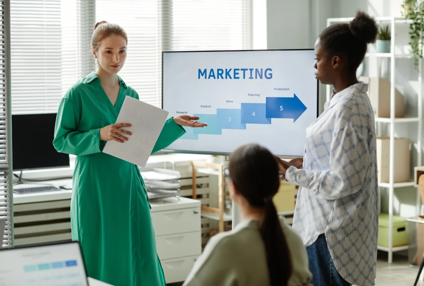 woman giving business presentation to her team mates