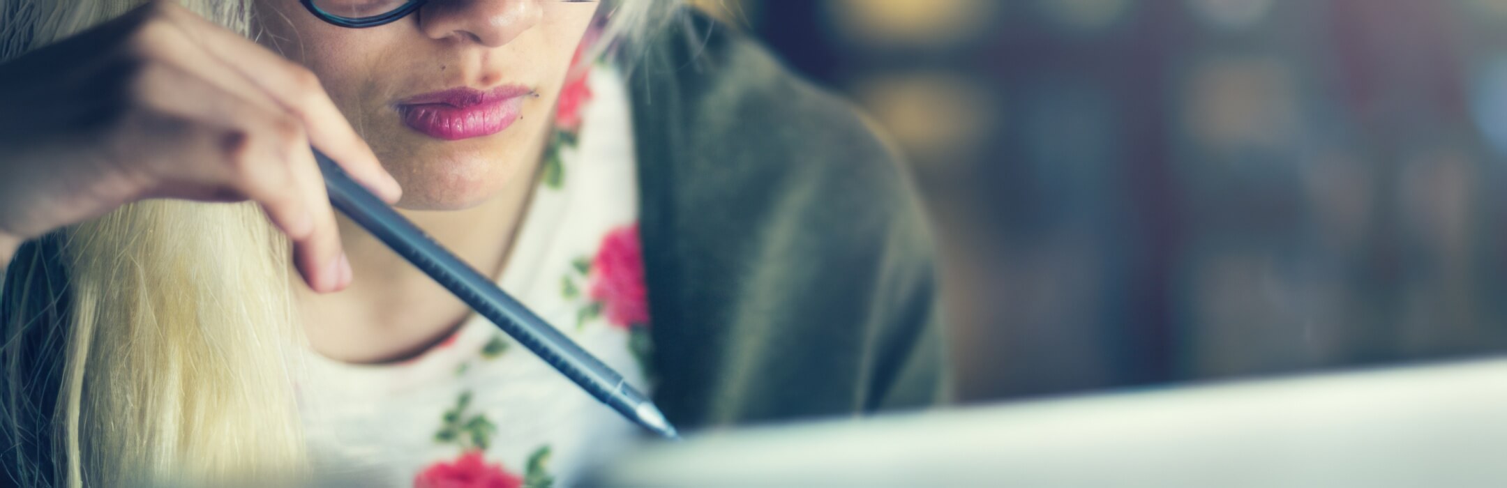 woman looking at computer screen