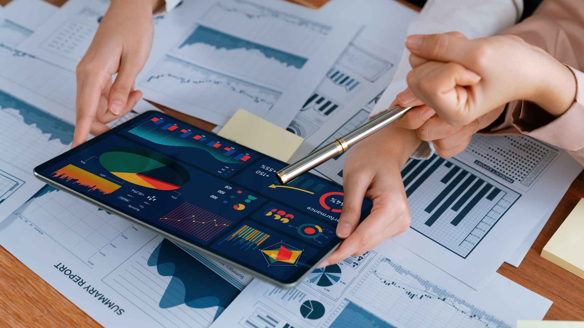 woman looking at the SEO dashboard using a tablet