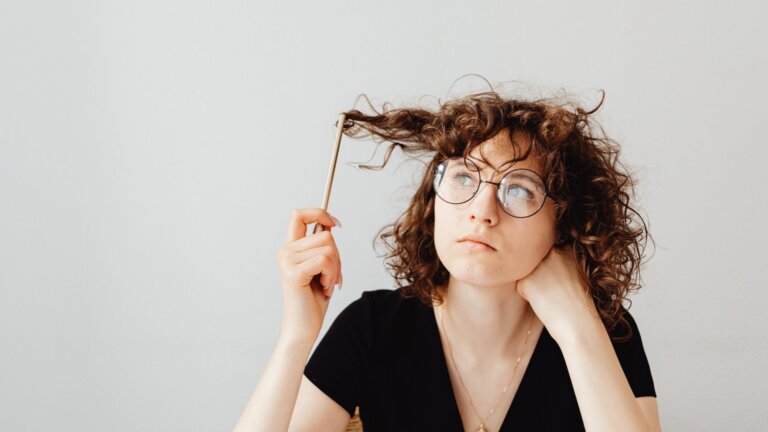 woman thinking in white background