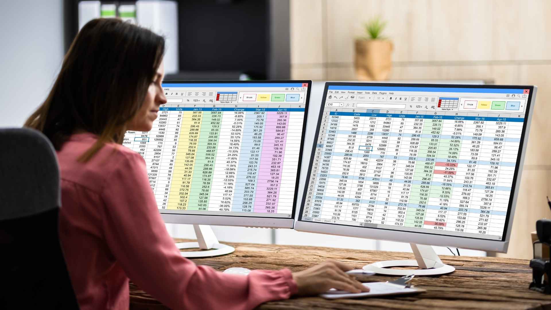 woman updating the data in the spreadsheet