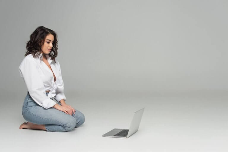 woman viewing her laptop