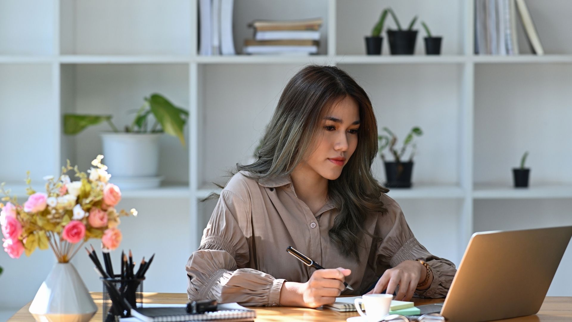 woman writing notes